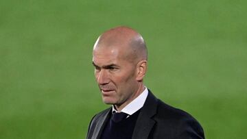 Real Madrid's French coach Zinedine Zidane looks on during the Spanish League football match between Real Madrid and Osasuna at the Alfredo Di Stefano stadium in Valdebebas in the outskirts of Madrid on May 1, 2021. (Photo by JAVIER SORIANO / AFP)