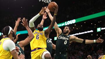 BOSTON, MASSACHUSETTS - JANUARY 28: Jayson Tatum #0 of the Boston Celtics defends LeBron James #6 of the Los Angeles Lakers in the final shot of regulation play during the fourth quarter  at TD Garden on January 28, 2023 in Boston, Massachusetts. The Celtics defeat the Lakers in overtime 125-121.  (Photo by Maddie Meyer/Getty Images)