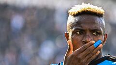 Napoli's Nigerian forward Victor Osimhen reacts during the Italian Serie A football match between Spezia and Napoli on February 5, 2023 at the Alberto-Picco stadium in La Spezia. (Photo by Alberto PIZZOLI / AFP)