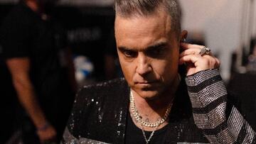 Robbie Williams recuerda cómo su mujer y él casi fueron decapitados en Haití