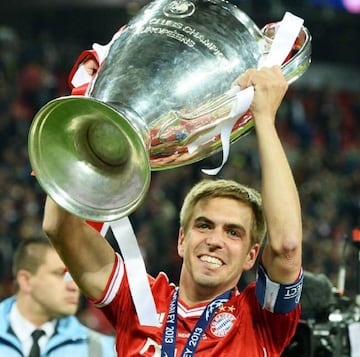 Lahm with the Champions League trophy in 2013.