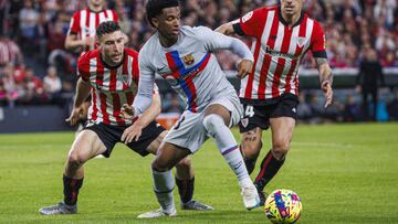 BILBAO, SPAIN - MARCH 12: Alejandro Balde (C) of Barcelona in action against Dani Garcia (R) of Athletic Bilbao during La Liga week 25 match between Athletic Bilbao and Barcelona at San Mames Stadium in Bilbao, Spain on March 12, 2023. (Photo by Pablo Garcia Sacristan/Anadolu Agency via Getty Images)