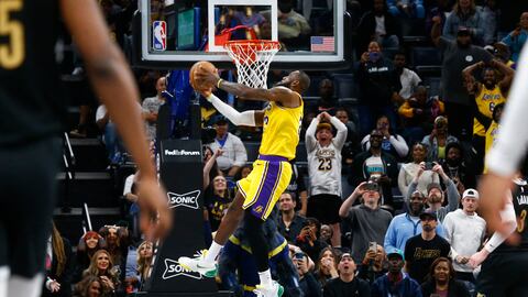Apr 12, 2024; Memphis, Tennessee, USA; Los Angeles Lakers forward LeBron James (23) dunks during the second half against the Memphis Grizzlies at FedExForum. Mandatory Credit: Petre Thomas-USA TODAY Sports