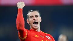 Gareth Bale of Wales celebrates following their side&#039;s victory in the 2022 FIFA World Cup Qualifier knockout round play-off match between Wales and Austria.