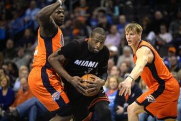 Dwyane Wade, Dion Waiters y Kyle Singler.