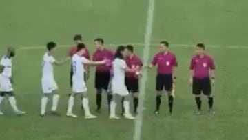 Player gets yellow card for refusing to shake official's hand