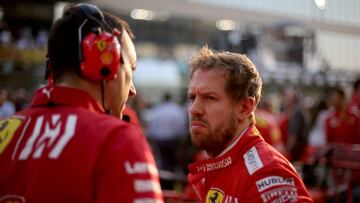 ABU DHABI, UNITED ARAB EMIRATES - DECEMBER 01: Sebastian Vettel of Germany and Ferrari prepares to drive on the grid before the F1 Grand Prix of Abu Dhabi at Yas Marina Circuit on December 01, 2019 in Abu Dhabi, United Arab Emirates. (Photo by Charles Coates/Getty Images)