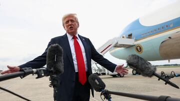 U.S. President Donald Trump speaks with the media after attending the FIFA Club World Cup final upon his arrival at Joint Base Andrews, Maryland, U.S, July 13, 2025. REUTERS/Kevin Lamarque