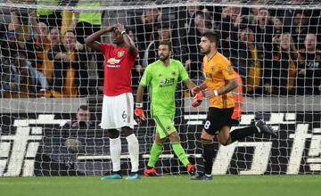 Pogba reacts to his penatly miss against Wolves.