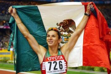 Medallista Olímpica de Plata en Atenas 2004. Campeona Mundial en París 2003.