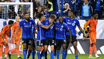 Oct 4, 2023; Montreal, Quebec, CAN; CF Montreal midfielder Lassi Lappalainen (21) celebrates with teammates after scoring during the second half against the Houston Dynamo at Stade Saputo. Mandatory Credit: Eric Bolte-USA TODAY Sports