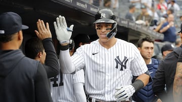NEW YORK, NEW YORK - SEPTEMBER 07: Aaron Judge #99 of the New York Yankees celebrates his fourth inning home run during game one of a doubleheader against the Minnesota Twins in the dugout with his teammates at Yankee Stadium on September 07, 2022 in the Bronx borough of New York City. Jim McIsaac/Getty Images/AFP