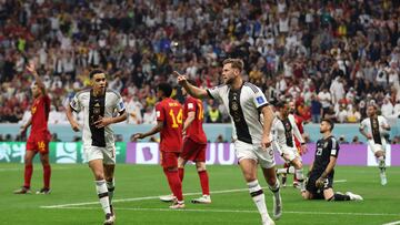 Soccer Football - FIFA World Cup Qatar 2022 - Group E - Spain v Germany - Al Bayt Stadium, Al Khor, Qatar - November 27, 2022 Germany's Niclas Fullkrug celebrates scoring their first goal with Jamal Musiala REUTERS/Matthew Childs