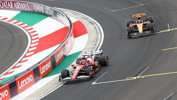 Formula One F1 - Hungarian Grand Prix - Hungaroring, Budapest, Hungary - August 3, 2025 Ferrari's Charles Leclerc and McLaren's Oscar Piastri in action during the race REUTERS/Bernadett Szabo