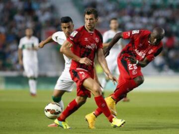 Grzegorz Krychowiak y Mbia.