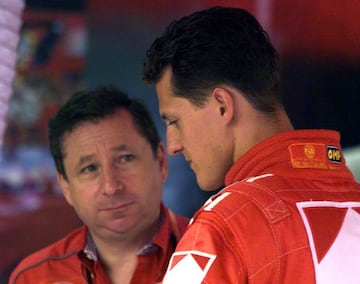 MAG02D:SPORT-MOTOR RACING:MAGNY-COURS,FRANCE, 26JUN99 - Michael Schumacher of Germany discusses technical issues with Ferrari manager Jean Todt during free session Formula One trials at Magny-Cours race track June 26. The qualifying session takes place la