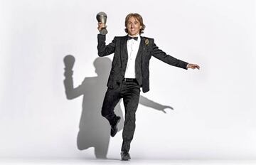 Luka Modric of Croatia and Real Madrid pose for a picture with his The Best FIFA Men's Player Award during The Best FIFA Football Awards at Royal Festival Hall on September 24