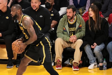 US actor Adam Sandler (2-R) watches the NBA basketball game between the Denver Nuggets and the Los Angeles Lakers in Los Angeles, California USA, 08 February 2024.