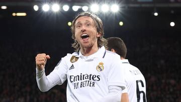 LIVERPOOL, ENGLAND - FEBRUARY 21: Luka Modric of Real Madrid celebrates after Karim Benzema of Real Madrid ( not pictured ) during the UEFA Champions League round of 16 leg one match between Liverpool FC and Real Madrid at Anfield on February 21, 2023 in Liverpool, England. (Photo by Alex Livesey - UEFA/UEFA via Getty Images)
