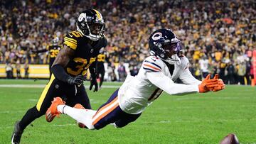 PITTSBURGH, PENNSYLVANIA - NOVEMBER 08: Darnell Mooney #11 of the Chicago Bears dives for an incomplete pass in front of Arthur Maulet #35 of the Pittsburgh Steelers during the fourth quarter at Heinz Field on November 8, 2021 in Pittsburgh, Pennsylvania.
