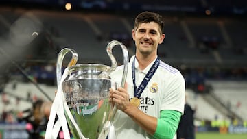 FILE PHOTO: Soccer Football - Champions League Final - Liverpool v Real Madrid - Stade de France, Saint-Denis near Paris, France - May 28, 2022 Real Madrid's Thibaut Courtois celebrates winning the champions league with the trophy REUTERS/Molly Darlington/File Photo
