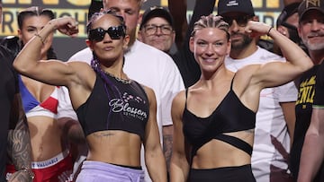 SAN JUAN, PUERTO RICO - MARCH 01: Amanda Serrano (L) and Nina Meinke pose during the weigh in for Serrano's IBF, WBO and WBA featherweight women's titles at Distrito T-Mobile on March 01, 2024 in San Juan, Puerto Rico. They will fight at Coliseo de Puerto Rico on March 2, 2024.   Al Bello/Getty Images/AFP (Photo by AL BELLO / GETTY IMAGES NORTH AMERICA / Getty Images via AFP)