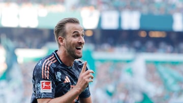 Bayern Munich's English forward #09 Harry Kane celebrates after scoring the 0-3 goal during the German first division Bundesliga football match between SV Werder Bremen and FC Bayern Munich in Bremen, northern Germany on September 21, 2024. (Photo by AXEL HEIMKEN / AFP) / DFL REGULATIONS PROHIBIT ANY USE OF PHOTOGRAPHS AS IMAGE SEQUENCES AND/OR QUASI-VIDEO