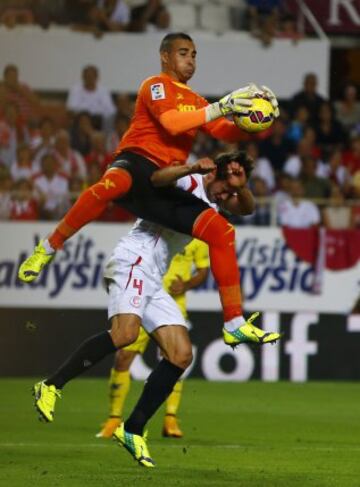 Grzegorz Krychowiak y Sergio Asenjo