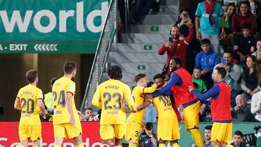 Barcelona's Spanish forward Ansu Fati (3R) celebrates scoring his team's second goal with teammates during the Spanish league football match between Elche CF and FC Barcelona at the Martinez Valero stadium in Elche on April 1, 2023. (Photo by M. Ramon / AFP)