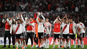 River Plate players celebrate at the end of the Copa Libertadores group stage first leg football match between River Plate and Sporting Cristal at the Monumental stadium in Buenos Aires on April 19, 2023. (Photo by Luis ROBAYO / AFP)