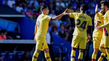 GETAFTE, SPAIN - SEPTEMBER 28: (L-R) Luis Suarez of FC Barcelona, Junior of FC Barcelona celebrate goal during the La Liga Santander  match between Getafe v FC Barcelona at the Coliseum Alfonso Perez on September 28, 2019 in Getafte Spain (Photo by David 