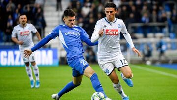 RC Genk&#039;s Romanian midfielder Ianis Hagi (l) vies with Napoli&#039;s Macedonian defender Eljif Elmas during the UEFA Champions League football match Group E between Napoli and RC Genk, on October 02, 2019 at the Cristal Arena in Genk, Belgium. (Photo