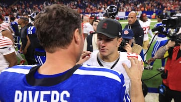 INDIANAPOLIS, INDIANA - DECEMBER 22: Philip Rivers #17 of the Indianapolis Colts and Brock Purdy #13 of the San Francisco 49ers shake hands after the game at Lucas Oil Stadium on December 22, 2025 in Indianapolis, Indiana. Justin Casterline/Getty Images/AFP (Photo by Justin Casterline / GETTY IMAGES NORTH AMERICA / Getty Images via AFP)