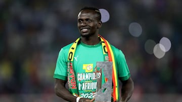 Soccer Football - Africa Cup of Nations - Final - Senegal v Egypt - Olembe Stadium, Yaounde, Cameroon - February 6, 2022 Senegal's Sadio Mane celebrates with the player of the tournament award after the match REUTERS/Mohamed Abd El Ghany