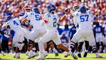 GAINESVILLE, FLORIDA - NOVEMBER 23: Jaxson Dart #2 of the Mississippi Rebels throws a pass during the first half of a game against the Florida Gators at Ben Hill Griffin Stadium on November 23, 2024 in Gainesville, Florida. James Gilbert/Getty Images/AFP (Photo by James Gilbert / GETTY IMAGES NORTH AMERICA / Getty Images via AFP)