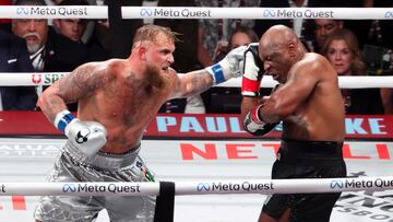 FILE PHOTO: Nov 15, 2024; Arlington, Texas, UNITED STATES; Mike Tyson (black gloves) fights Jake Paul (silver gloves) at AT&T Stadium. Mandatory Credit: Kevin Jairaj-Imagn Images/File Photo