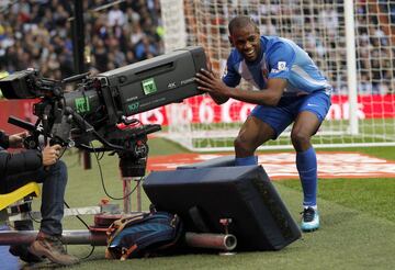 Rolán celebrates his equaliser.