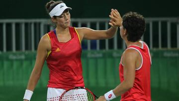 Muguruza y Carla Suárez avanzan a cuartos (7-5, 2-6, 6-2)