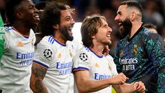 Real Madrid's Brazilian forward Vinicius Junior, Real Madrid's Brazilian defender Marcelo, Real Madrid's Croatian midfielder Luka Modric and Real Madrid's French forward Karim Benzema(L to R) celebrate after the UEFA Champions League semi-final second leg football match between Real Madrid CF and Manchester City at the Santiago Bernabeu stadium in Madrid on May 4, 2022. (Photo by GABRIEL BOUYS / AFP)