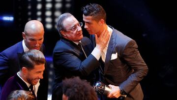 Soccer Football - The Best FIFA Football Awards - London Palladium, London, Britain - October 23, 2017 Real Madrid’s Cristiano Ronaldo speaks with Real Madrid president Florentino Perez after winning The Best FIFA Men’s Player Award as coach