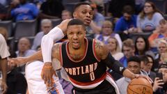 Mar 7, 2017; Oklahoma City, OK, USA; Portland Trail Blazers guard Damian Lillard (0) drives to the basket in front of Oklahoma City Thunder guard Russell Westbrook (0) during the fourth quarter  at Chesapeake Energy Arena. Mandatory Credit: Mark D. Smith-USA TODAY Sports