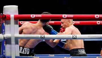 LOS ANGELES, CALIFORNIA - AUGUST 3: Jose Valenzuela lands a punch against Isaac Cruz during the sixth round of the WBA Super Lightweight Title at BMO Stadium on August 3, 2024 in Los Angeles, California. Kevork Djansezian/Getty Images/AFP (Photo by KEVORK DJANSEZIAN / GETTY IMAGES NORTH AMERICA / Getty Images via AFP)