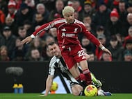 Liverpool's French striker #22 Hugo Ekitike runs with the ball during the English Premier League football match between Liverpool and Newcastle United at Anfield in Liverpool, north west England on January 31, 2026. (Photo by Paul ELLIS / AFP) / RESTRICTED TO EDITORIAL USE. No use with unauthorized audio, video, data, fixture lists, club/league logos or 'live' services. Online in-match use limited to 120 images. An additional 40 images may be used in extra time. No video emulation. Social media in-match use limited to 120 images. An additional 40 images may be used in extra time. No use in betting publications, games or single club/league/player publications. /