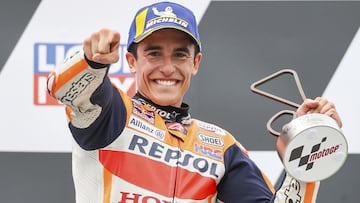 Rider Marc Marquez from Spain of the Repsol Honda Team reacts after winning the Moto GP race at the Sachsenring circuit in Hohenstein-Ernstthal, Germany, Sunday, June 20, 2021. (Jan Woitas/dpa via AP)
