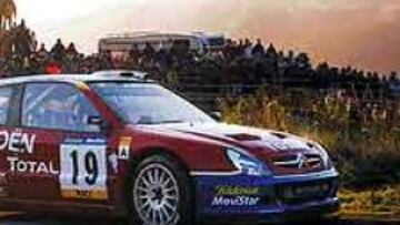 <b>TRIBUNA PREFERENTE.</B> Cualquier lugar es bueno para seguir a Carlos Sainz en los tramos catalanes. Una grúa elevadora se convierte en una ubicación excepcional.