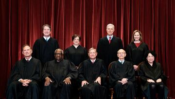 FILE PHOTO: Associate Justice Brett Kavanaugh, Associate Justice Elena Kagan, Associate Justice Neil Gorsuch, Associate Justice Amy Coney Barrett, Associate Justice Samuel Alito, Associate Justice Clarence Thomas, Chief Justice John Roberts, Associate Justice Stephen Breyer and Associate Justice Sonia Sotomayor pose for a group photo at the Supreme Court in Washington, U.S., April 23, 2021. Erin Schaff/Pool via REUTERS/File Photo