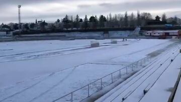 Pitch for Unionistas vs Real Madrid Copa del Rey game covered in snow