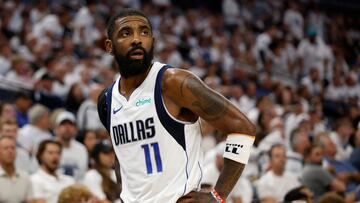 MINNEAPOLIS, MINNESOTA - MAY 30: Kyrie Irving #11 of the Dallas Mavericks looks on during the fourth quarter against the Minnesota Timberwolves in Game Five of the Western Conference Finals at Target Center on May 30, 2024 in Minneapolis, Minnesota. NOTE TO USER: User expressly acknowledges and agrees that, by downloading and or using this photograph, User is consenting to the terms and conditions of the Getty Images License Agreement. David Berding/Getty Images/AFP (Photo by David Berding / GETTY IMAGES NORTH AMERICA / Getty Images via AFP)