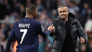 Paris Saint-Germain's Spanish coach Luis Enrique consoles Paris Saint-Germain's French forward #07 Kylian Mbappe after the UEFA Champions League Group F football match between Newcastle United and Paris Saint-Germain at St James' Park in Newcastle-upon-Tyne, north east England on October 4, 2023. Paris SG coach Luis Enrique's decision to take Kylian Mbappe off at half-time against Monaco on March 1, 2024, following two other matches in which the superstar was cut back, now comes three days before a crucial Champions League match. (Photo by FRANCK FIFE / AFP)