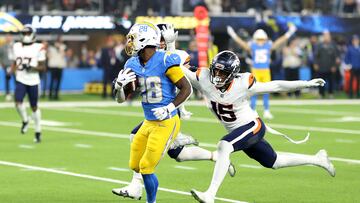 INGLEWOOD, CALIFORNIA - DECEMBER 19: Hassan Haskins #28 of the Los Angeles Chargers runs the ball to score a 34 yard touchdown against Nik Bonitto #15 of the Denver Broncos during the fourth quarter in the game at SoFi Stadium on December 19, 2024 in Inglewood, California. Sean M. Haffey/Getty Images/AFP (Photo by Sean M. Haffey / GETTY IMAGES NORTH AMERICA / Getty Images via AFP)